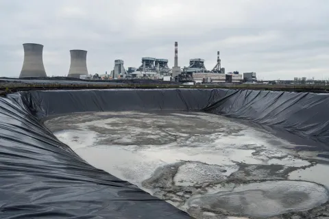 Industrial ash pond containment lining